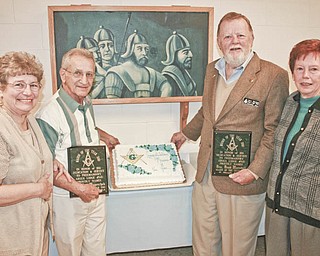Mason of the Year awards were given to two longtime members of Argus Lodge 545 during a recent meeting. After the presentation, from left, Sue and Robert Mayerchak join Larry and Georgia Marshall, who accepted the award in behalf of their son, Bradford Marshall.