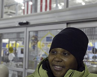 William D. Lewis|The Vindicator A large crowd qued up outside the Boardman Best Buy at 5am Friday to get Black Friday bargins. NicoleNixon of Youngstown was first in the line.