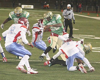 FOOTBALL - Akise Teague flies over the defense for yards Saturday night in Ashland. - Special to The Vindicator/Nick Mays