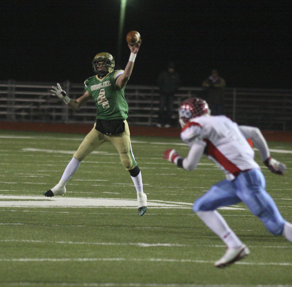 FOOTBALL - Paul Kempe fires the ball down field Saturday night in Ashland. - Special to The Vindicator/Nick Mays