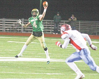 Ursuline's Paul Kempe fires the ball down field Saturday night in Ashland.