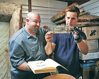  Clinton "Ton" Jones, left, and Allen Haff are shown in a scene from "Auction Hunters," about prospectors who bid on abandoned storage units that are put up for public auction.  The series airs on Tuesdays at 10 p.m. EST on Spike TV. 