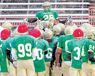 Akise Teague is hoisted onto the shoulders of his teamate after being named Mr. Ohio during Ursuline's football practice at Stambaugh Stadium on Wedesday December 1, 2010.