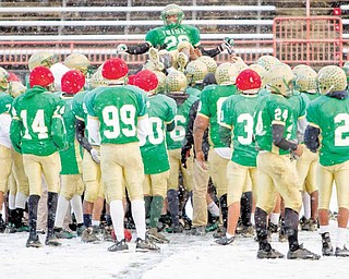 Akise Teague is hoisted onto the shoulders of his teamate after being named Mr. Ohio during Ursuline's football practice at Stambaugh Stadium on Wedesday December 1, 2010.