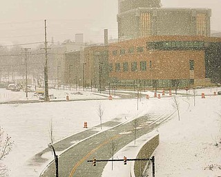 The $2 million Hazel Street extension project begins with the curved section shown here that goes uphill from Commerce Street in the city’s downtown to Wood Street, with a retaining wall at right. The street extension then runs straight north for two blocks to its Lincoln Avenue terminus at the Youngstown State University campus.