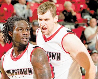 YSU's Ashen Ward (20) and Dan Boudler (33) during the second half of a game at YSU's Beeghly Center on Tuesday evening.
