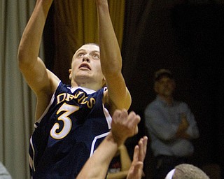 McDonald's Stephen Politano (3) takes a shot during a game at Western Reserve High School on Friday evening.