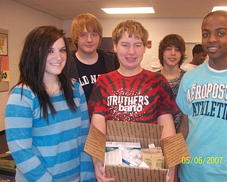 The freshmen at Struthers High School participated in The Vindicator's Operation Holiday Cheer project recently. The students put together 17 packages and wrote 180 letters to send to area soldiers. Among those involved in the project were, from left, Rachel Buser, Austin Freet, David Joliff, D.J. Kegarise and Isaiah Bush.