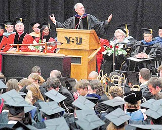 Eric D. Fingerhut, Chancellor of the Ohio Board of Regents, speaks to Youngstown State University graduates on many topics including the history and excellence of Ohio’s educational system to finding employment in uncertain times. Fingerhut received an honorary degree, joining more than 700 students in Sunday’s commencement in Beeghly Center.