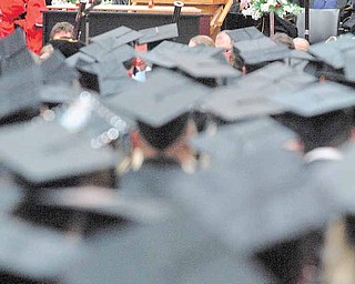 Ikram Khawaja, provost and vice president for academic affairs at Youngstown State University, addresses the crowd of more than 700 graduating students at Sunday’s commencement ceremony in Beeghly Center.
