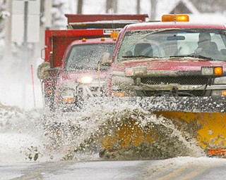 Cortland's Street Deptartment plows North High Street last week during the first big snowfall of the season. Expect to see sights like this as parts of the Valley may experience up to a foot of snow today.