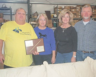 Habitat volunteers are honored: Four volunteers were recognized by Habitat for Humanity of Mahoning County for their work at Habitat’s ReStore and service to the organization. From left to right are Joe McCabe, Bette Pacella, Aggie Butler and Joseph Hallas, who received the Golden Nail awards at a dinner in late November. Hallas has volunteered at ReStore for three years, and Butler, McCabe and Pacella donated their time over two years. Presenting the awards was ReStore manager Linda Hartwig, not pictured, who explained the importance of volunteers in the success of the organization. Habitat has built 29 homes, and its goal for 2011 is to build four more. The profits of ReStore pay for the administration of the Habitat projects.
