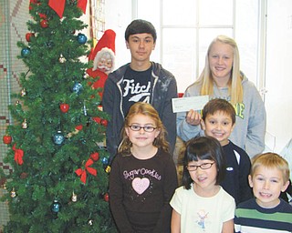 Do unto others ... Students at St. Patrick School in Hubbard recently sent Catholic Charities of the Diocese of Youngstown a check for $275 to benefit one of its programs, Keep Kids Warm, this winter. Catholic Charities offers the program to low-income families who do not qualify for other forms of government assistance. The money raised from the students’ dress-down day each Friday goes to different organizations that help those in need. The students also donate food items to local food banks. Among the students are, from left to right in front, Claire Riffle, Gia Li Dugan and Sammy Murcho; middle, Joe Madeline; and back, Bobby Dulay and Katie Conlan.