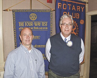 Mentors in the making: Don Garrett, left, of Youngstown Goodwill Industries spoke recently at a meeting of the Youngstown Rotary Club regarding the Goodwill Goodguides program. The youth program provides a one-on-one mentor to low-income, at-risk youngsters by older mentors and includes the youths’ families. The mentors are required to commit for one year, have a minimum of four hours per month with the youth, and communicate with the parents. With Garrett is Rotarian John Fahnert.
