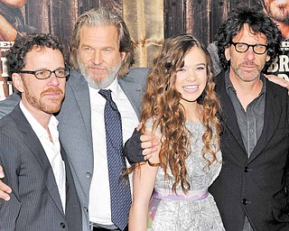 From left, co-director Ethan Coen, actor Jeff Bridges, actress Hailee Steinfeld and co-director Joel Coen attend the premiere of 'True Grit' at the Ziegfeld Theatre on Tuesday, Dec. 14, 2010 in New York.