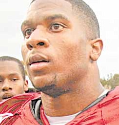 In this photo taken on Oct. 23, 2010, Arkansas running back Knile Davis walks off the field after their 38-24 victory over Mississippi in an NCAA college football game in Fayetteville, Ark. Davis has established himself as the No. 19 Razorbacks' top running back headed into Saturday's game against Vanderbilt.