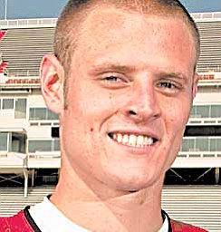 Arkansas quarterback Ryan Mallett poses for a photograph during NCAA college football media day at Razorback Stadium in Fayetteville, Ark., Saturday, Aug. 7, 2010. Mallett, who threw for 3,624 yards and 30 touchdowns last season, is practicing with the team after recovering from a broken foot.