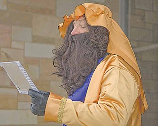 An actor portraying one of the wise men at a live nativity scene held at St. Joseph and Immaculate Heart of Mary School in Austintown.