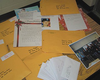 For a second year, students in West Branch High School's mentoring program, Freshmen Focus, participated in The Vindicator's Operation Holiday Cheer project. The students chose 16 servicemen and women, some of whom are graduates of West Branch, to send these Christmas cards and letters. Freshmen Focus is a yearlong mentoring program in which 11th- and 12th-grade students mentor freshmen.