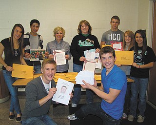 The ‘write’ holiday project: An Operation Holiday Cheer article in The Vindicator inspired students in West Branch High Schools’ Freshmen Focus mentoring program to write to area men and women who are serving in the military and unable to be home for the holidays. As a result 16 of those will receive cards, a class picture, personal letters, and a letter explaining that Focus is a yearlong program in which 11th- and 12th-grade students mentor freshmen by providing lessons on a variety of personal, social, academic and career topics. Displaying some of the “write” stuff are, from left in front, Robert Brand and Zach Altman, and in back, Taylor Metzgar; Parker Zamarelli; Erica Polinori and Brenda Sharp, mentor teachers; Kahliel Fletcher; Molly Wyss; and Hayley Kozar.