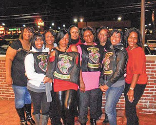 Dangerous Curvez ahead: The women’s motorcycle club Dangerous Curvez Inc. made financial awards to three organizations at the annual Christmas Party on Dec. 11 at O’Charley’s in Boardman. Zina Hill accepted a check for Dress For Success in the absence of its CEO, Felicia Davis; Patricia Rudolph represented My Best Tea Party Club; and Crystal Wells accepted for Listen Up Ladies.