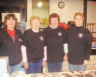 Bazaar for Girard: Roberta Lawrentz, Martha Altier, Laura Sobnosky and Kathie Rossell of Girard Junior Women serve refreshments at the annual GJW Bazaar. The next meeting will be Jan. 13 at Amen Corner with Liz McGarry as speaker. Altier will be the hostess for the evening with Kitty Diamond assisting. GJW is a nonprofit group that serves the Girard community. Anyone interested in joining should contact Lawrentz. 