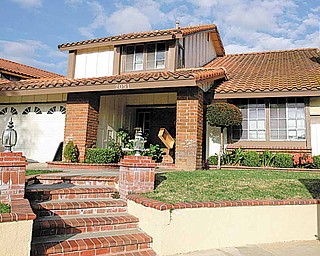 This March 9, 2009 file photo shows the house in which Nadya Suleman, mother of octuplets, has been living in for nearly two years in La Habra, Calif. The man who sold the home to Suleman says he is going ahead with eviction proceedings because she can't come up with a $450,000 balloon payment.