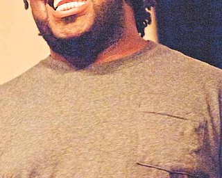 Rashad Adams rehearses with the Emancipation Choir, which will sing Negro spirituals at the Emancipation Proclamation and Installation Service at 10 a.m. Saturday at New Bethel Baptist Church in Youngstown.
