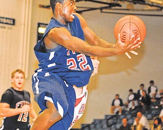 Fitch's #22 Dontrell Lawrence puts up an off balance shot during the second half.