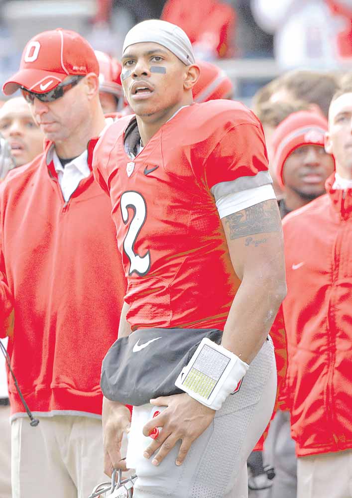 Ohio State  quarterback Terrelle Pryor (2) watches from the sidelines during second quarter action in their NCAA college football game against Michigan on Saturday, Nov. 27, 2010, in Columbus, Ohio. 