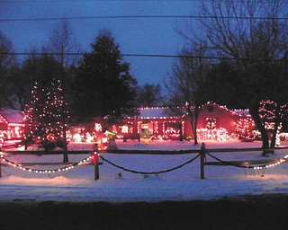 Marian and Raymond Beil have been lighting up their house in North Lima for 43 years and still love doing it!