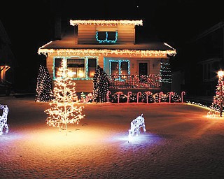 Dave Messersmith's front yard in Youngstown boasts a festive holiday display.