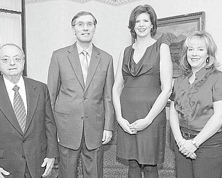 ROBERT K. YOSAY | THE VINDICATOR: Honored during the American Heart Association 2011 Heart Ball on Feb. 12 will be, from left, Dr. Dominic A. Bitonte, the 2011 Heart of the Community Award honoree, and Dr. Gary A. Young, recipient of the 2011 Cardiac Services Award, who share a moment with Regina Rebhan, a Heart Ball sponsor; and Rachel Barber, event chairwoman.