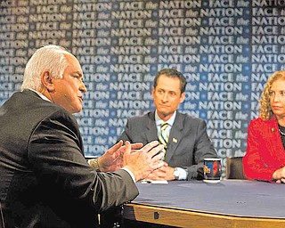 In this photo provided by CBS, Rep.-elect Mike Kelly, R-Pa., left, and representatives Anthony Weiner, D-N.Y., and Debbie Wasserman Schultz, D-Fla., discuss what's ahead for the new Congress on CBS's "Face the Nation" in Washington Sunday, Jan. 2, 2011.