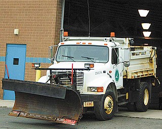 Another truck done- an ODOT snow/slag truck leaves the inspection garage at the Canfield Facility.
