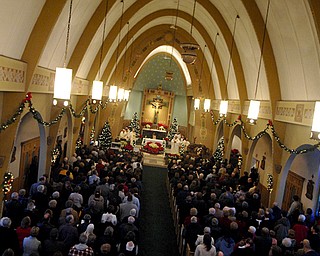 St. Elizabeth’s Church in Campbell holds its final mass at 9 a.m. Sunday. As part of the Parish Implementation Plan, the church will close its doors and the parish will relocate to other churches within the Diocese of Youngstown due to decreasing membership, increasing costs and lack of priests.