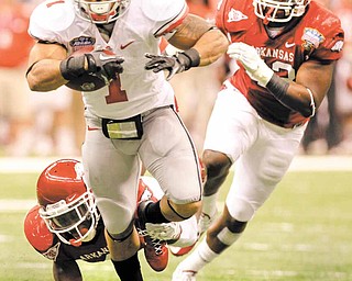 Ohio State running back Dan Herron (1) rushes during the second quarter of the Sugar Bowl NCAA college football game at the Louisiana Superdome in New Orleans, Tuesday, Jan. 4, 2011. (AP Photo/Patrick Semansky)