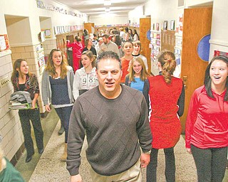 Michael Kerensky, Canfield Village Middle School teacher and supporter of the Race to the Top initiative, walks the hallways with students as he helps ready the school, teachers and administrators for the new program.