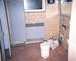 This bathroom, also photographed Dec. 15, shows broken and unclean fixtures. Area Agency on Aging 11 provided The Vindicator with the photos, shot to augment the state’s monitoring of the facility.