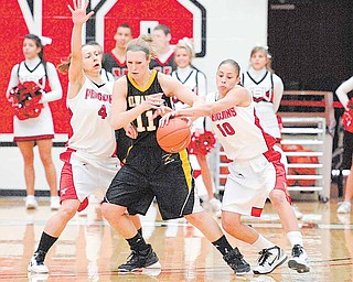YSU Penguin Maryum Jenkins (10) strips the ball away from Lindsay Laur of the Milwakee Panthers.