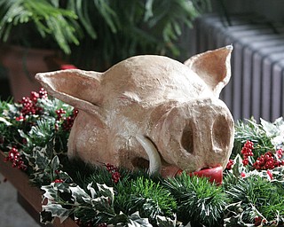 The boar’s head, symbolizing the triumph of Christ over evil, is carried into St. John’s Episcopal Church, 323 Wick Ave., Sunday to mark the 50th anniversary of the Youngstown church’s Boar’s Head and Yule Log Festival, which is held annually on the second Sunday in January.