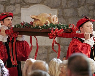 Traditional costumes are part of the annual Boar’s Head and Yule Log Festival at St. John’s Episcopal Church in Youngstown, which marked its 50th year Sunday. The festival is a liturgical drama featuring the traditions of early Christianity and of the Medieval and Renaissance periods.