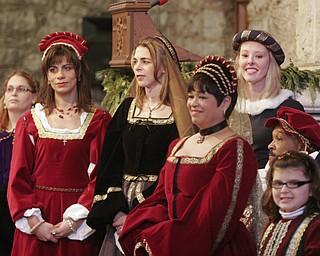 Traditional costumes are part of the annual Boar’s Head and Yule Log Festival at St. John’s Episcopal Church in Youngstown, which marked its 50th year Sunday. The festival is a liturgical drama featuring the traditions of early Christianity and of the Medieval and Renaissance periods.