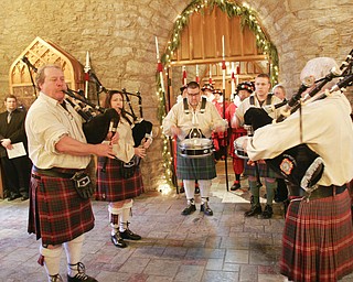 Traditional costumes are part of the annual Boar’s Head and Yule Log Festival at St. John’s Episcopal Church in Youngstown, which marked its 50th year Sunday. The festival is a liturgical drama featuring the traditions of early Christianity and of the Medieval and Renaissance periods.