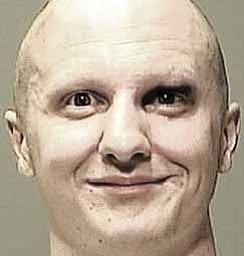 This undated photo released by the Pima County Sheriff's Office shows shooting suspect Jared Loughner.