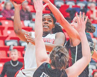 YSU Penguin Brandi Brown shoots and scores while being defended by Green Bay's Sarah Eichler(43) and Julie Wojta (32).