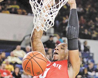 Ohio State forward Jared Sullinger (0) dunks during the first half of an NCAA college basketball game against Michigan in Ann Arbor, Mich, Wednesday, Jan. 12, 2011. (AP Photo/Carlos Osorio)