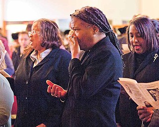 Pastor Sylvia Jennings of Oak Missionary Baptist Church becomes emotional during a service held Sunday at Tabernacle Baptist Church to honor Dr. Martin Luther King Jr. The service featured a talk by Bishop Durant K. Harvin III of Baltimore.