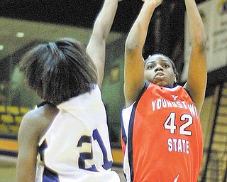 KSU's Taylor Stanton tries to block a shot by YSU's Brandi Brown during the first period on Wednesday night at the Kent State MAC center in Kent, Ohio.