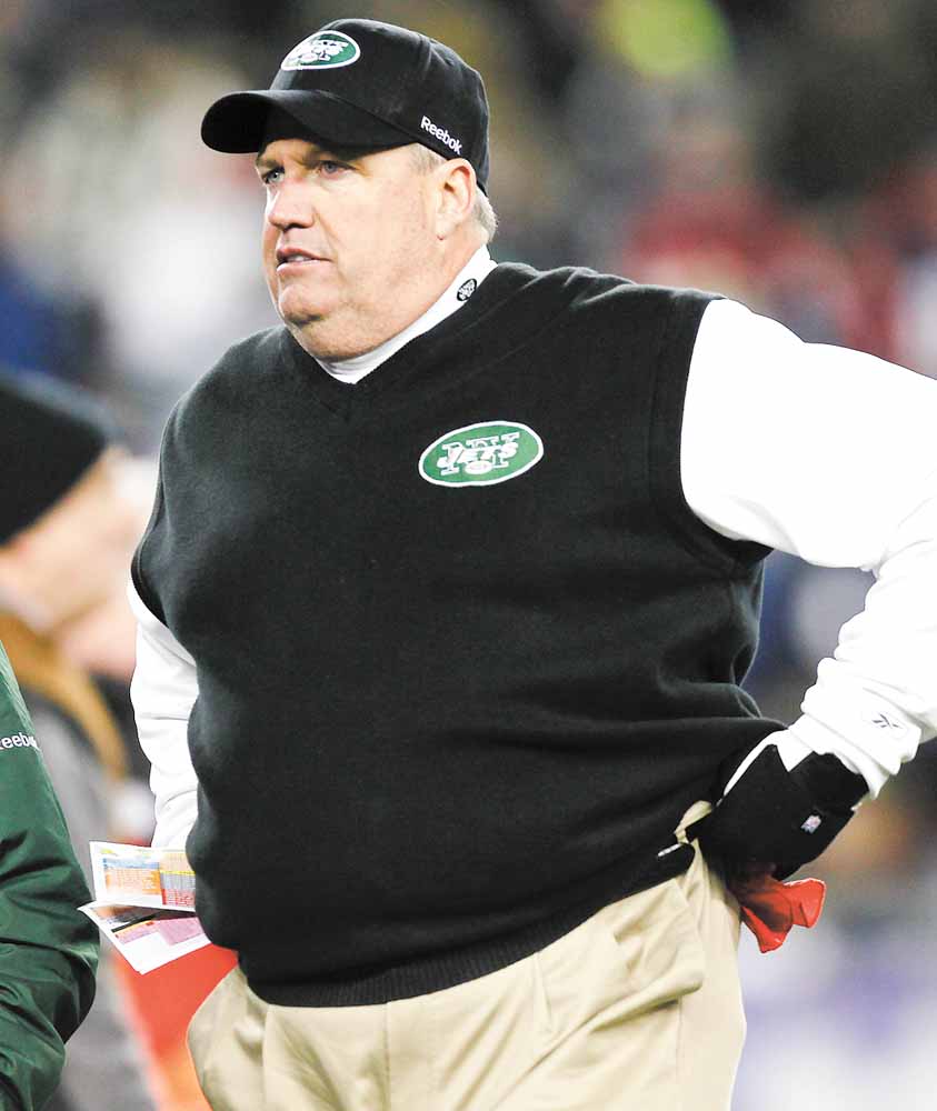 New York Jets head coach Rex Ryan watches his team play against the New England Patriots during the second half of an NFL divisional football playoff game in Foxborough, Mass., Sunday, Jan. 16, 2011. 